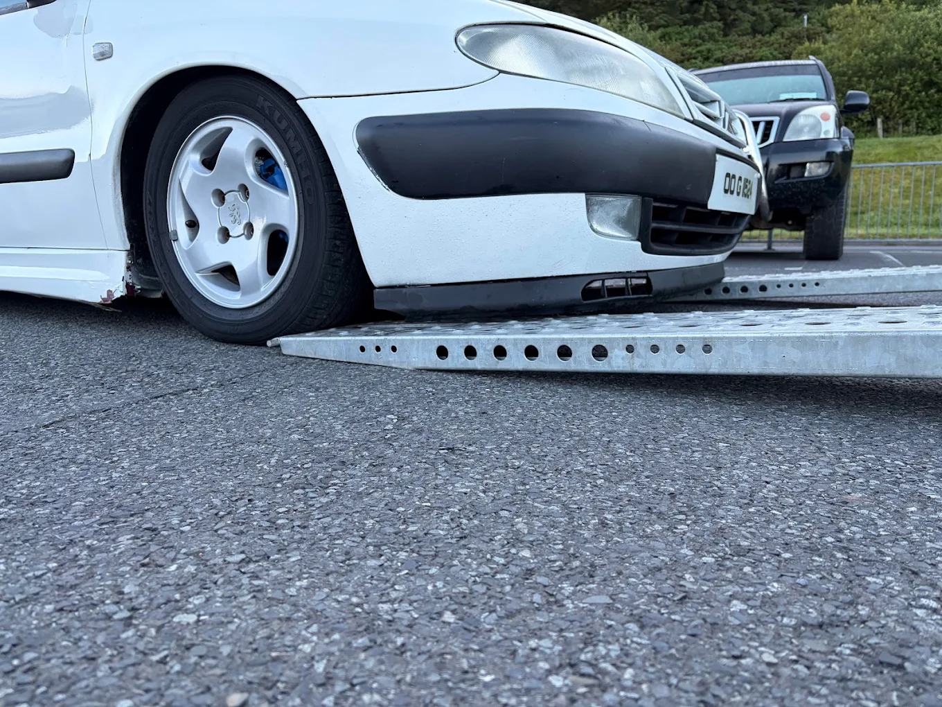 Ultra-low loader trailer ready for a lowered vehicle